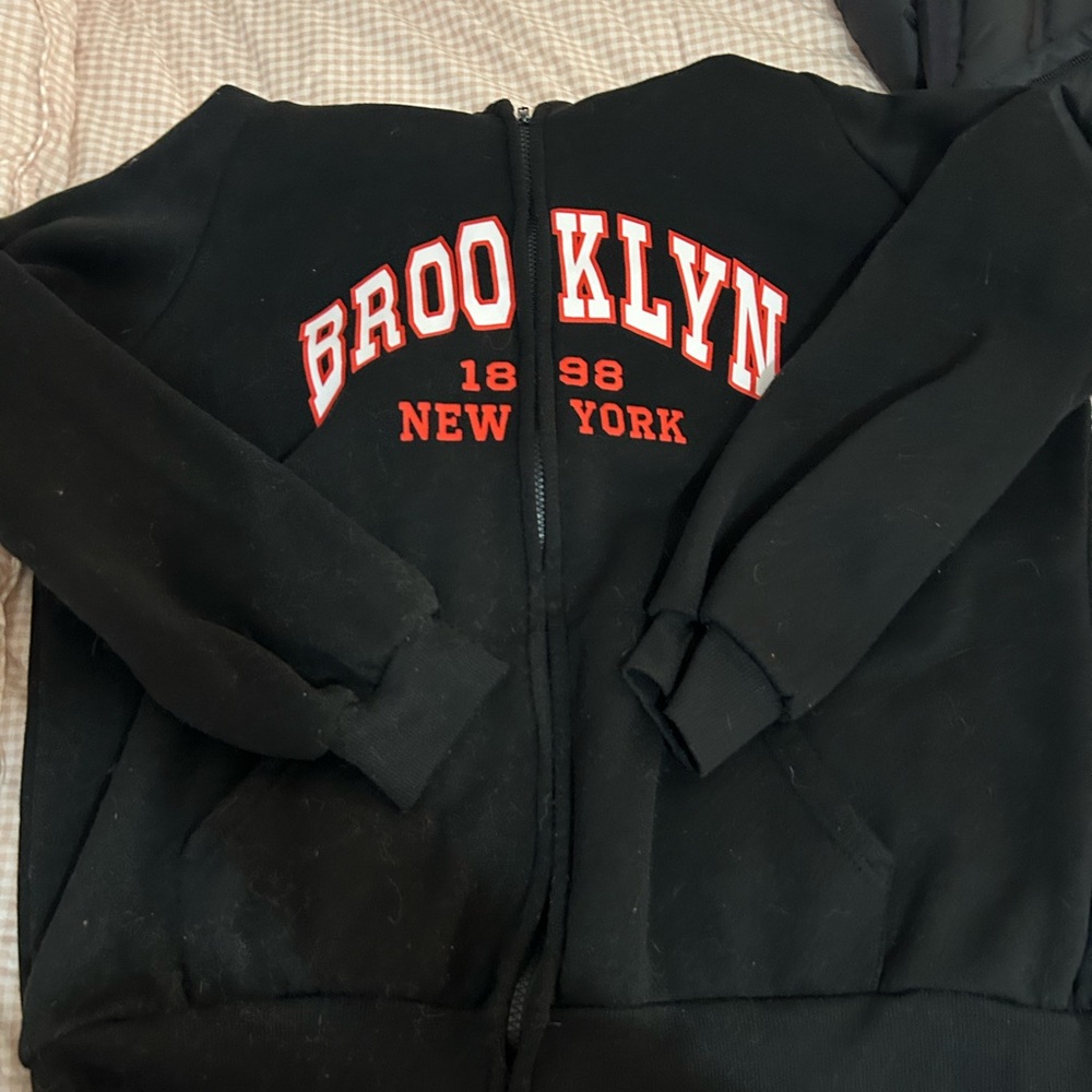 black brooklyn zip up sweater